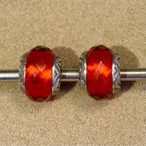 🆕Listing! Two Brighton Red Transparency beads Faceted glass Silver edges Retired